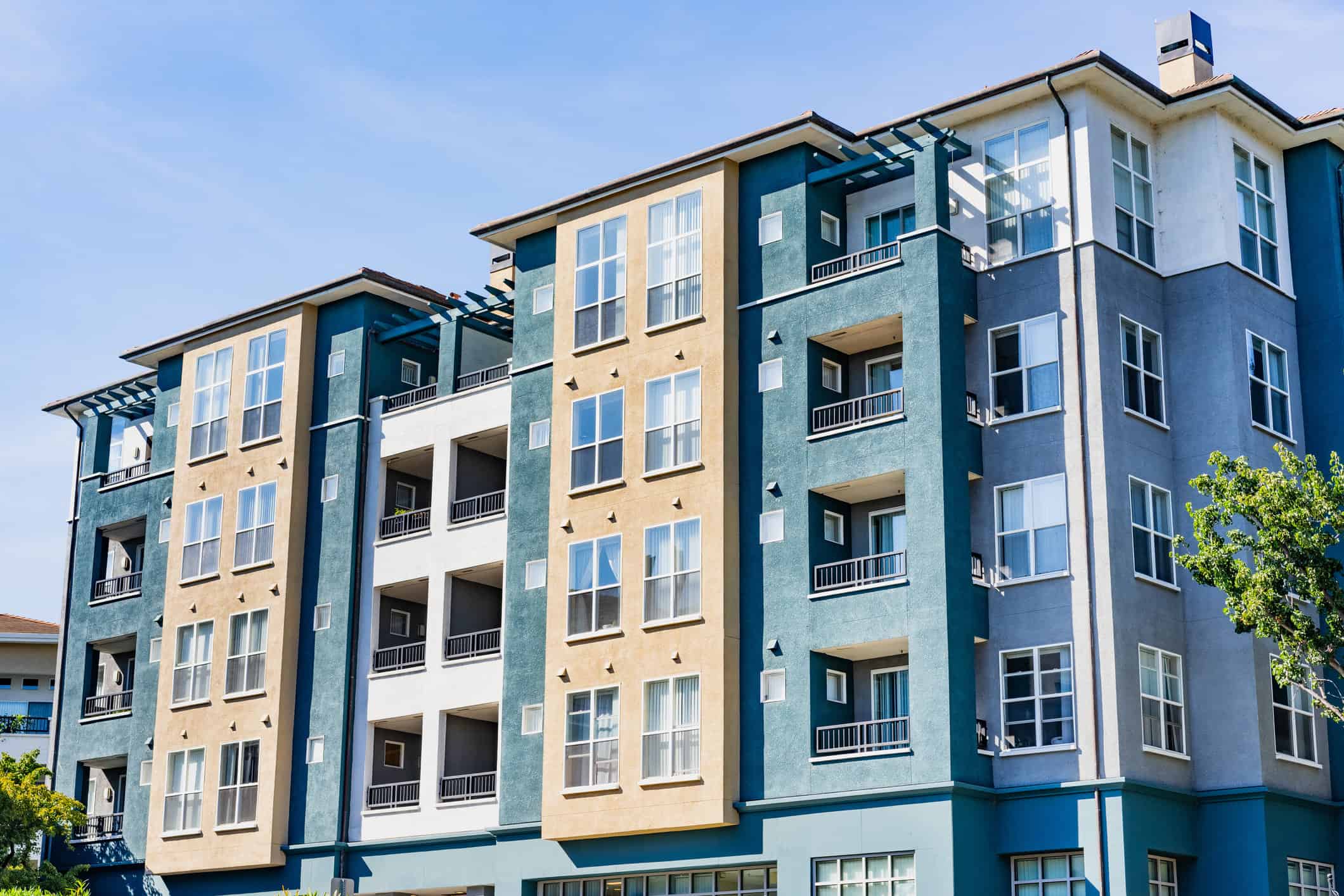 Exterior view of modern apartment building offering luxury rental units- Apartment Complex Exterior Painters- painting maintenance for commercial properties